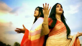 Bajlo Tomar Alor Benu Lyrics (বাজলো তোমার আলোর বেণু) - Agomoni Song - Durgapuja